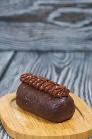 Potato cake. Decorated with chocolate cream.