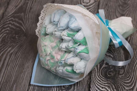 Zephyr bouquet in wrapping paper. Tulips and hydrangea from zephyr.の写真素材