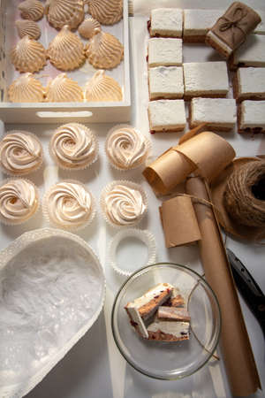 Homemade marshmallows of different shapes and sizes. Spread out on the table. Cooking zephyr at home.の写真素材