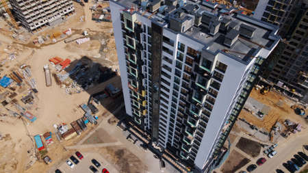 Modern urban development. Construction site with multi-storey buildings under construction....
