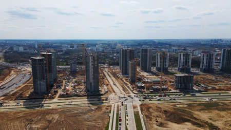 Modern urban development. Construction site with multi-storey buildings under construction....