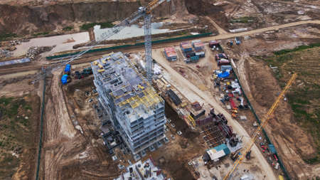 Modern urban development. Construction site with multi-storey buildings under construction....