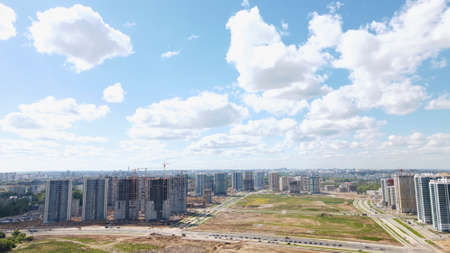 Modern urban development. Construction site with multi-storey buildings under construction....