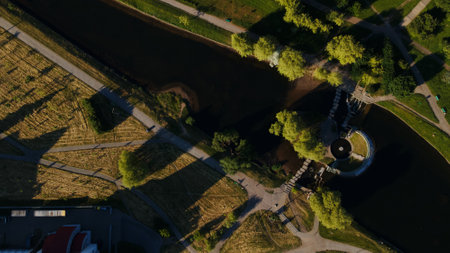 Urban water system. The river flowing in the city. With fountains and waterfalls. Aerial photography.の写真素材