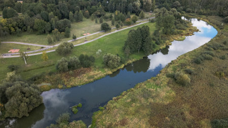 Park area. A river flows through it. Aerial photography.の写真素材
