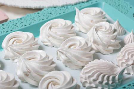 Homemade marshmallows of various shapes and colors are laid out on trays. Stabilization of Zephyr...