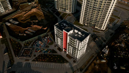 Construction site. Construction of modern multi-storey buildings. Against the background of the blue...