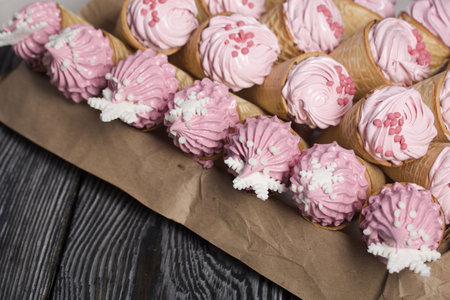 Zephyr in waffle cones. Decorated with decorative sprinkles and mastic snowflakes.の写真素材