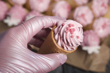 Zephyr in waffle cones. Decorated with decorative sprinkles and mastic snowflakes.の写真素材
