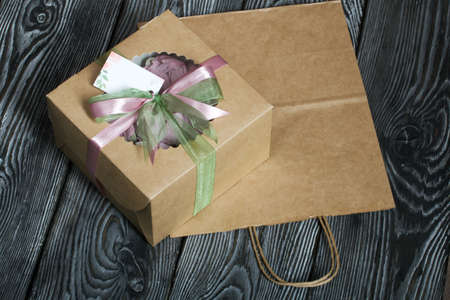 Roses, tulips and chrysanthemums from marshmallows. Zephyr flowers. In craft packaging. Tied with...
