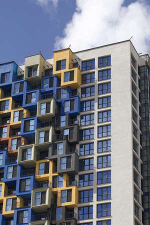 Construction of multi-storey buildings. Modern multi-storey building. Houses built of concrete and...