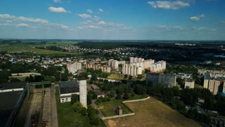 Tranquil suburbs in a big city. Multi-storey buildings and a large green area. Panoramic photo. aerial photography.の写真素材