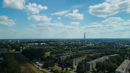 Tranquil suburbs in a big city. Multi-storey buildings and a large green area. Panoramic photo. aerial photography.の写真素材