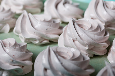 homemade zephyr. White tray with marshmallows. Stands on black pine boards. close-up.の写真素材