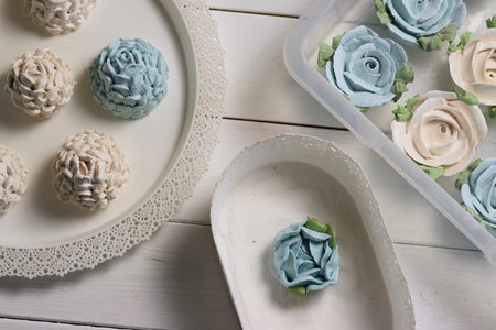 Homemade zephyr spread out on a tray. Flowers from zephyr. Close-up.の写真素材