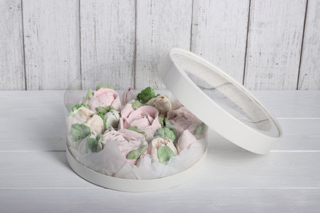 Marshmallow flowers. Marshmallows in the box. Homemade marshmallows. A white hatbox. A box with...