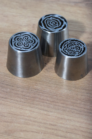 Set of pastry tips made from stainless steel. For creating marshmallow tulips of various shapes.の写真素材