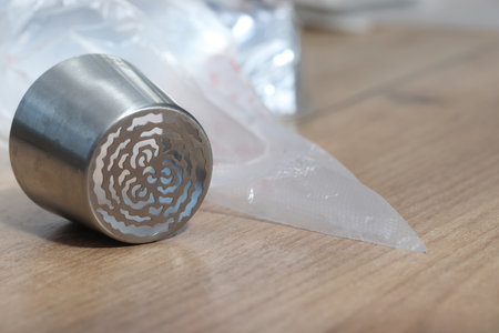 Pastry tip made from stainless steel. For making marshmallow tulips. Plastic pastry bag included.の写真素材