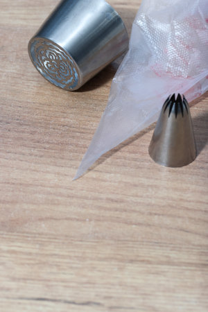 Set of pastry tips made from stainless steel. For making marshmallows. Plastic pastry bag included.の写真素材