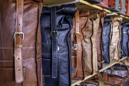 Close-up set of handmade leather handbags on displayの写真素材