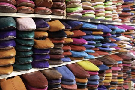 Colorful handmade leather shoes on displayの写真素材