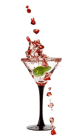 Martini Glass with a splash of Isolated on White Backgroundの写真素材