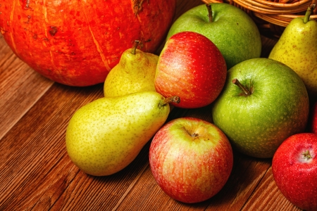Harvest of ripe fruits and vegetables: apples, pears and pumpkinの写真素材