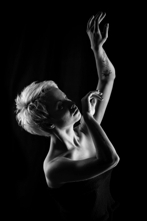Attractive girl dancing, filmed in black and white versionの写真素材