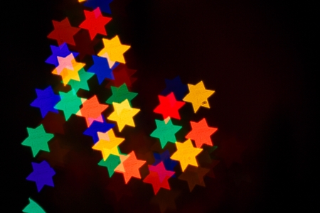 Multicolored bokeh abstract background for the holiday Hanukkahの写真素材