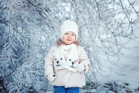 Cute little girl shot close-up on outdoors in winterの写真素材