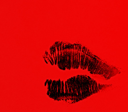 Imprint of lipstick passionate female lips closeup shotの写真素材