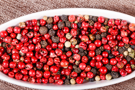 Mixture of fragrant peppers shot close up as abstract background