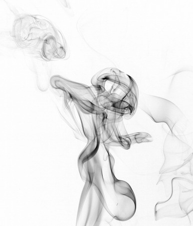 Abstract colored smoke closeup shot as the backdrop for the holidaysの写真素材