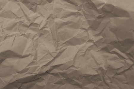 Toned color wrinkled paper texture shot close-upの写真素材