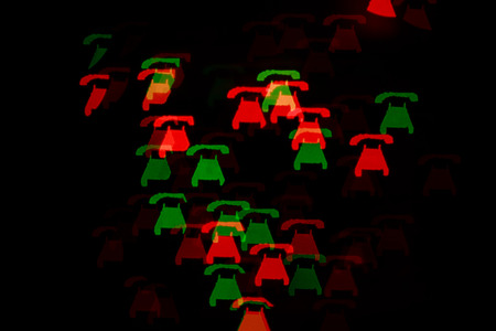 Multicolored abstract background of lights in the form of the phone is not in focusの写真素材