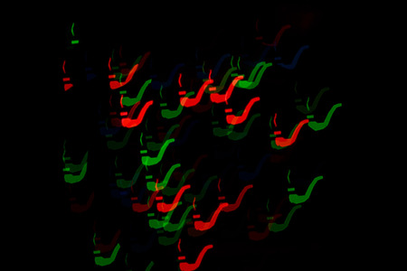 Multicolored abstract background of lights in the form of a pipe is not in focus