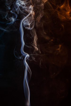 Abstract smoke moves on a black backgroundの写真素材