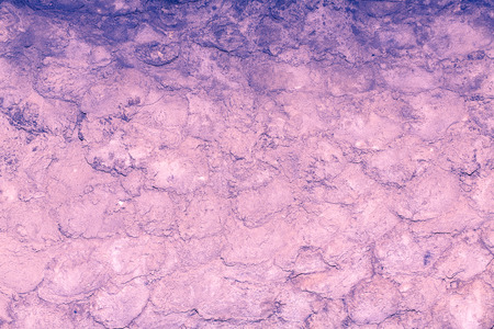 Grungy brickwork with cracks and chipped shot close-up, color tintingの写真素材