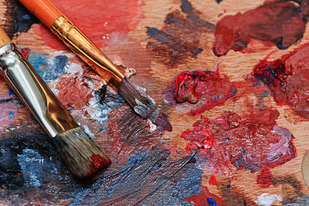 Brush and oil paint artist shot closeupの写真素材