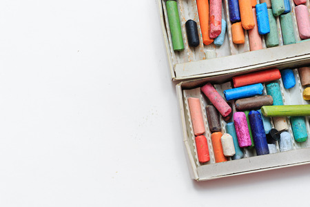 Colored pencils on paper lie in disorder. の写真素材