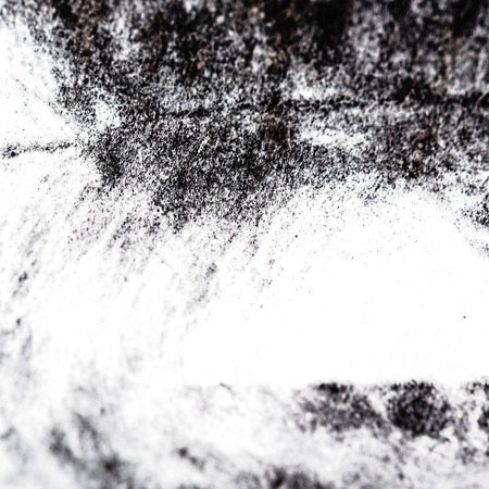 Grungy texture painted black charcoal pencil. Design elements on a white background.の写真素材