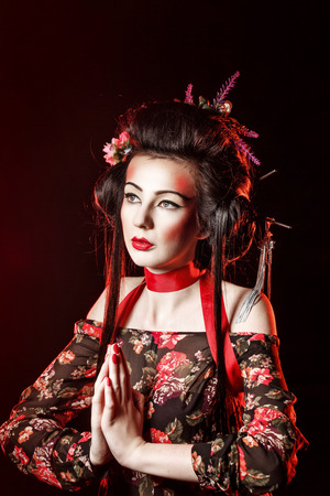 Traditional makeup and hairstyle Geisha, Kabuki actors. The concept of Asian beauty.の写真素材