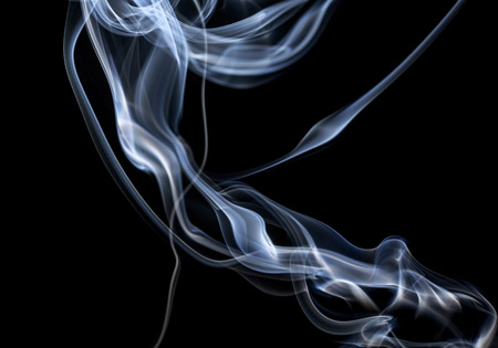 Abstract smoke on a black background. Texture. Design element. Abstract art. The smoke from the...