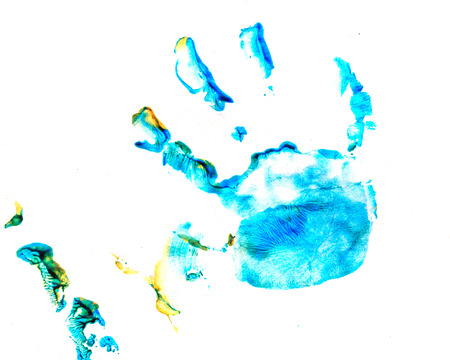 Abstract oil paint. Prints of children's palms. Paint brush strokes on canvas closeup. Colorful range of colors. Design elements. Color conversions.の写真素材