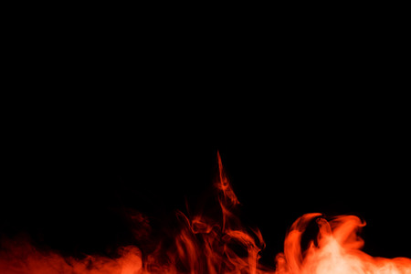 Abstract art. Red smoke hookah on a black background. Inhalation. The steam generator. The concept of poison gas. Gas.の写真素材