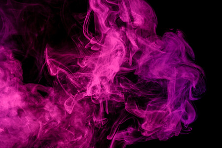 Abstract smoke Weipa. Personal vaporizers fragrant steam. The concept of alternative non-nicotine smoking. Magenta smoke on a black background. E-cigarette. Evaporator. Taking Close-up. Vaping.の写真素材
