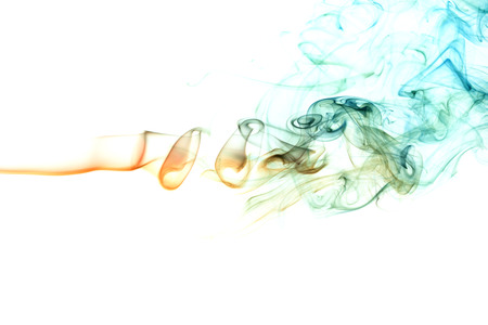 Abstract art. Turquoise smoke from the incense sticks on a white background. Background for Halloween. Texture fog. Design element. The concept of aromatherapy.の写真素材