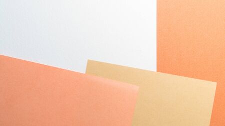 Colorful pastel paper stacks background. Abstract white beige copper brown colors. Minimalism...