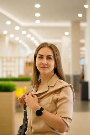Nice Girl Gladly Posing While Walk Mall In Good Mood. Lifestyle Fashion Portrait