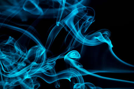 Abstract colored smoke hookah on dark background. Texture. Art Design element. Personal vaporizers...